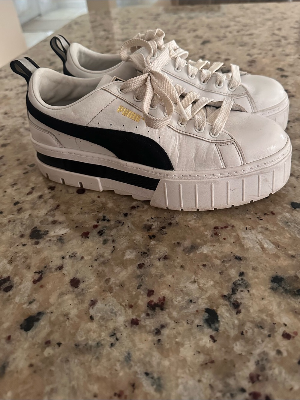 Puma White Platform Sneakers with Black Stripe and Gold Logo